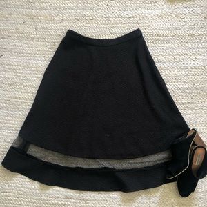 Mid length black skirt sz M